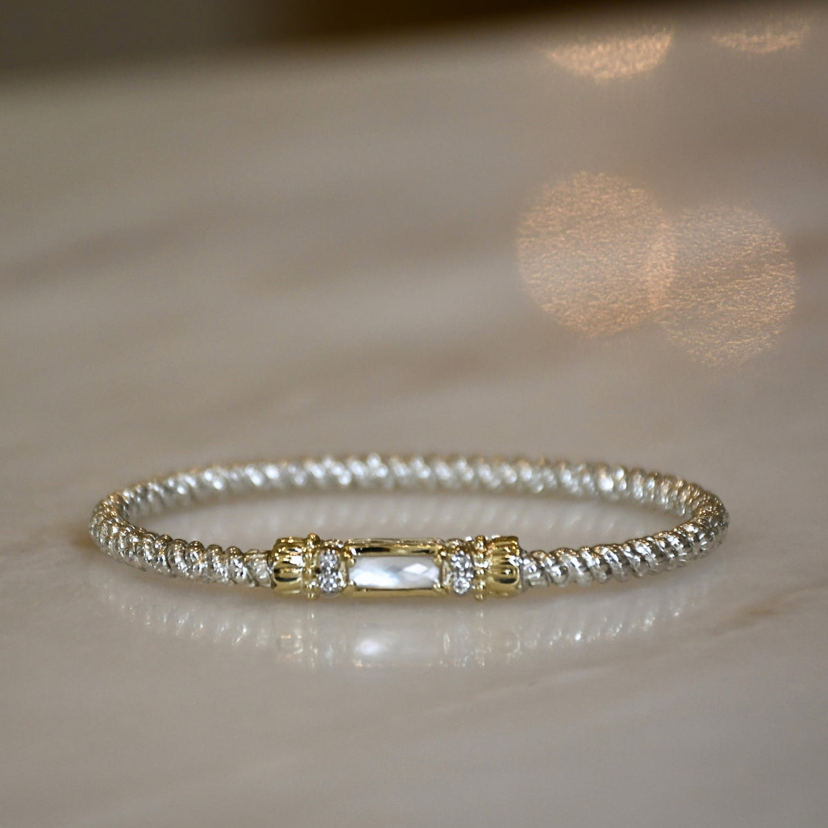 14ky/Sterling Silver Closed White Mother of Pearl Bangle Bracelet