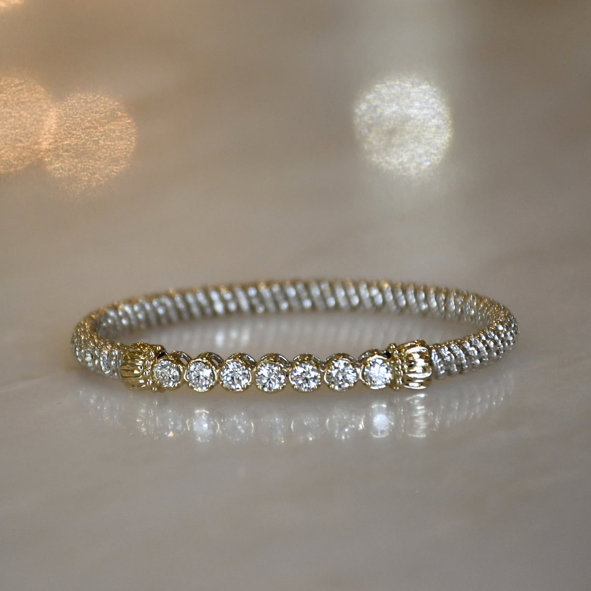 14KY/SS CLOSED DIAMOND BANGLE BRACELET