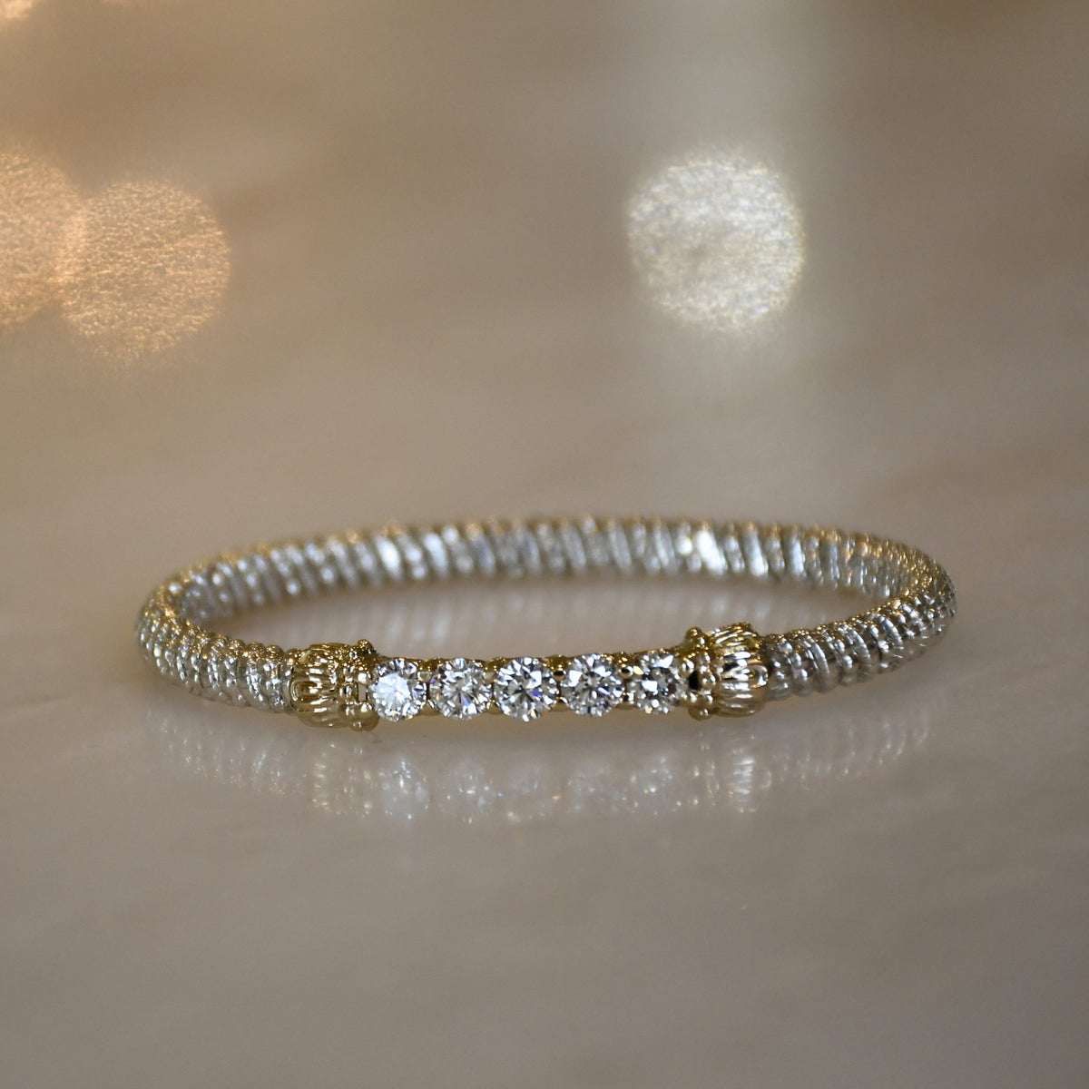 14KY/SS CLOSED DIAMOND BANGLE BRACELET
