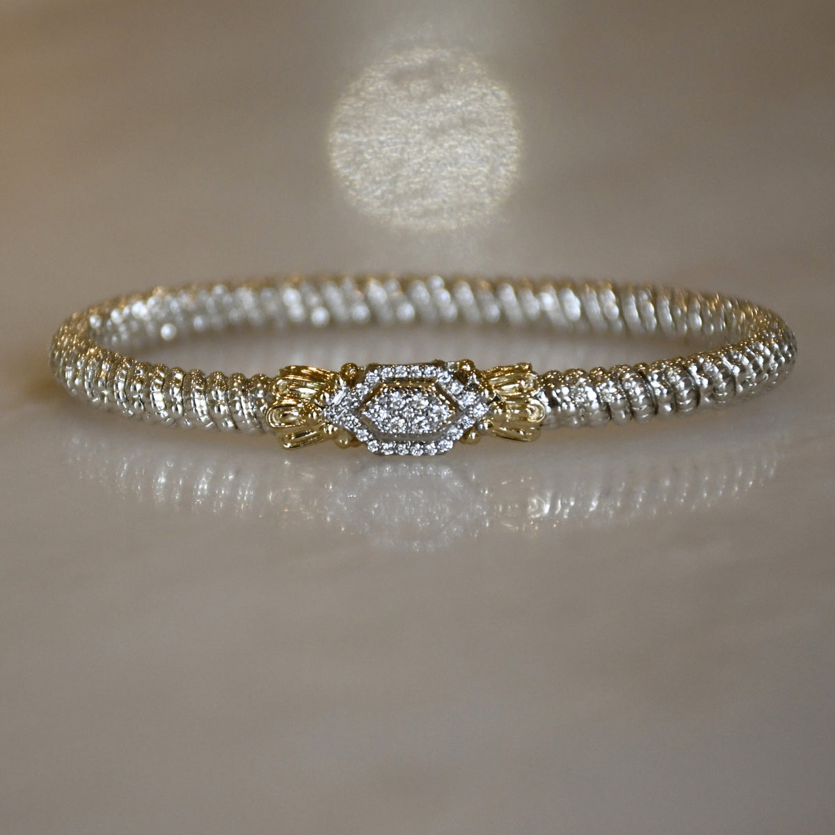 14KY/SS DIAMOND CLOSED BANGLE BRACELET