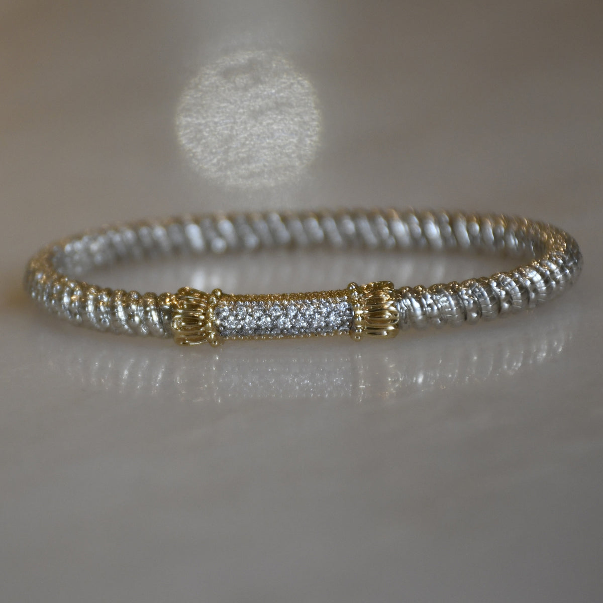 14KY/SS DIAMOND CLOSED BANGLE BRACELET