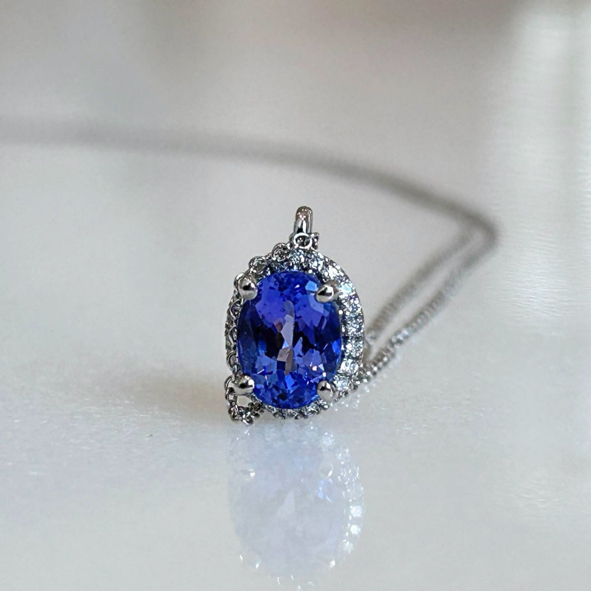 Tanzanite & Diamond Halo Pendant