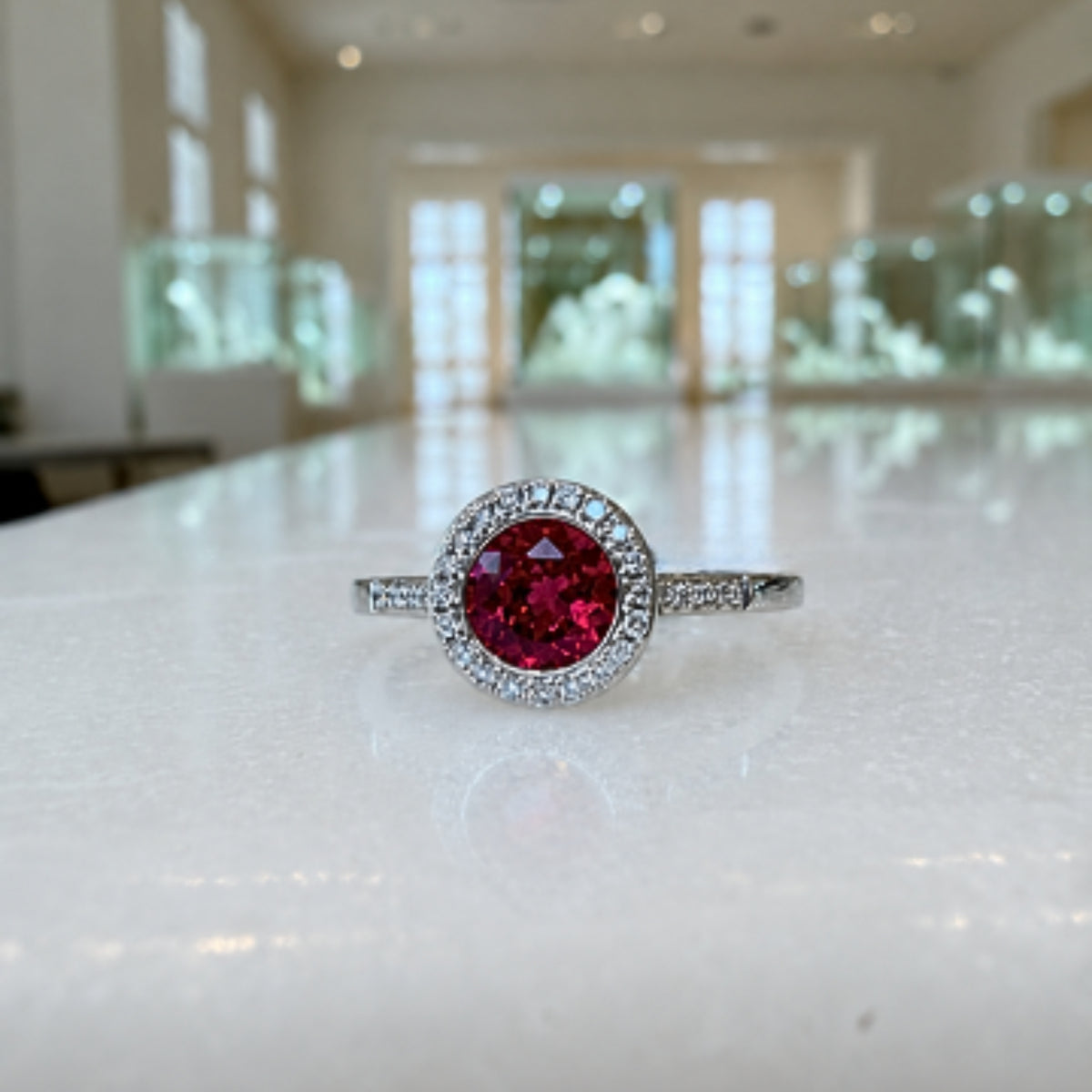 Red Corundum & Diamond Halo Ring