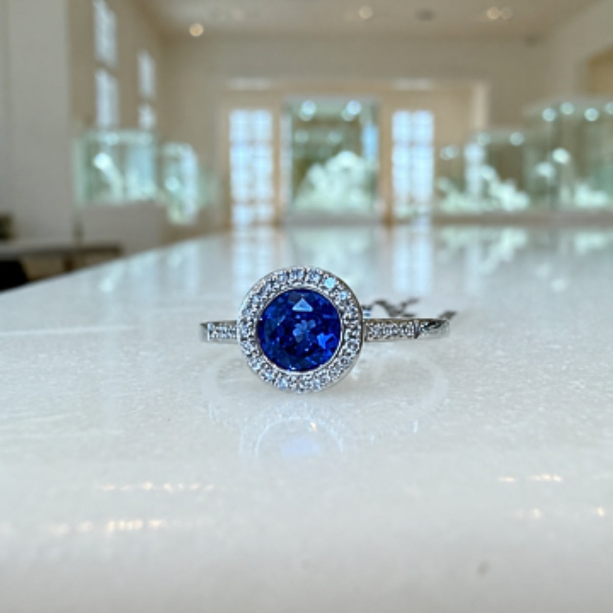 Sapphire Corundum & Diamond Halo Ring