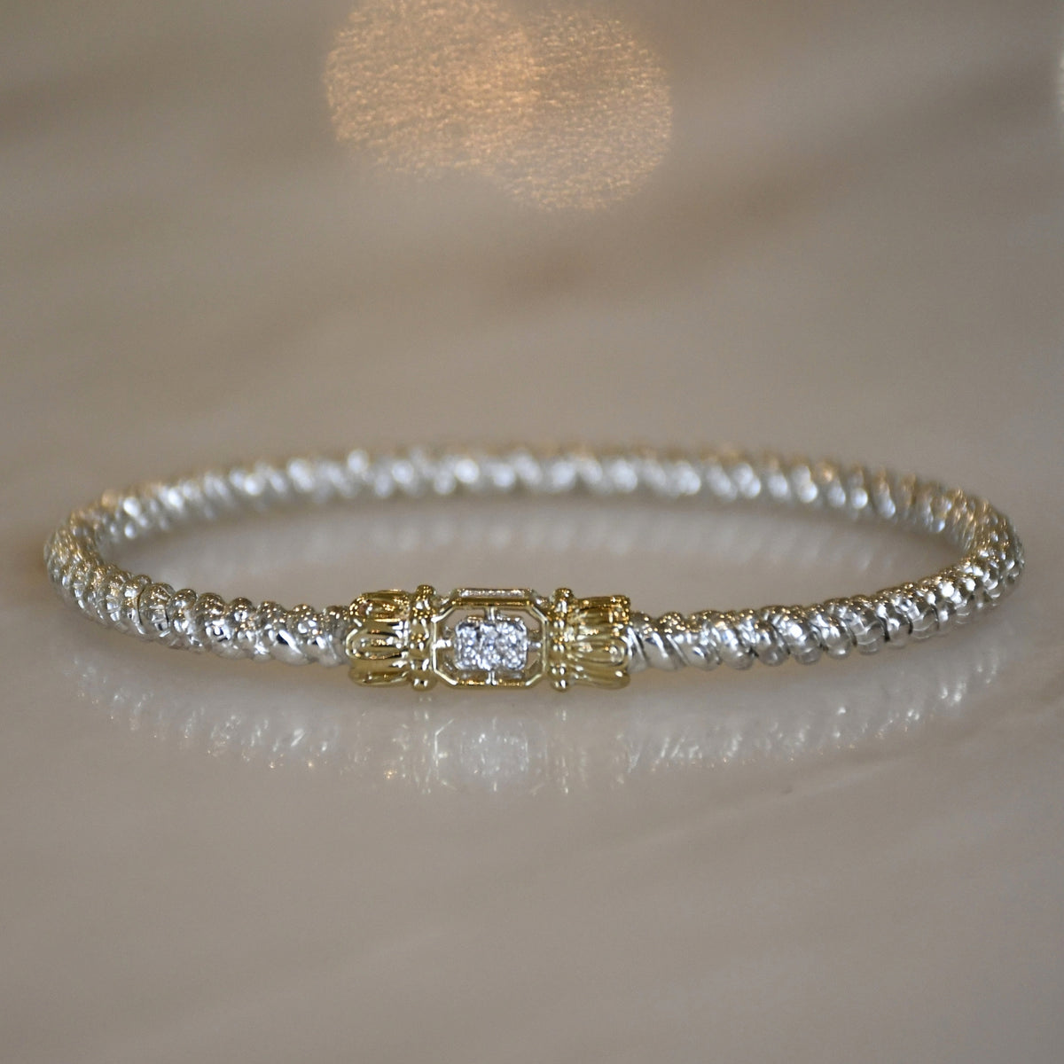 14ky/Sterling Silver Closed Bangle Bracelet